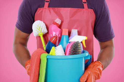 Office cleaning team working in an Acton business reception area