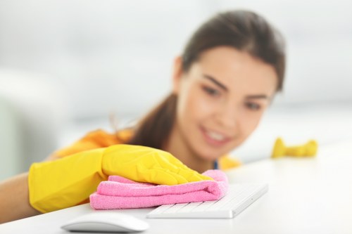 Cleaning communal carpeted areas in an Acton building